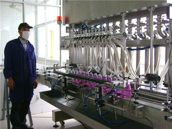 бөтелкедегі сұйықтық құю машинасы